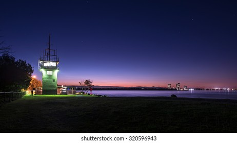 The Gold Coast Seaway With The Coast Guard Tower Overlooking The Wave Break Island And The Biggera Waters Skyline During Twilight, Doug Jennings Park, The Spit, Main Beach, Queensland, Australia