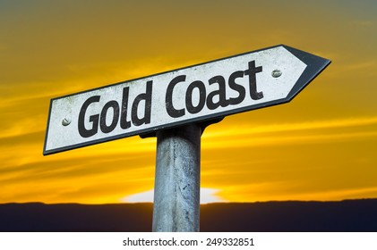 Gold Coast Sign With A Sunset Background