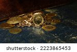 Gold coin 10 pounds on the background of jewelry and gold coins of Europe selective focus finance background