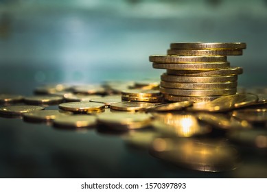 Gold coins stacks is representing riches and wealth management. Coin stack growing and find out the way to get a return on investment. Finance and money exchange investment as concept.
