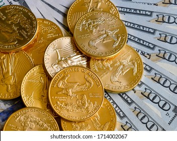 Gold Coins With US Dollar Currency Notes