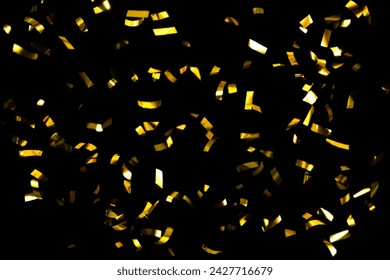 Gold Confetti On A Black Background - Powered by Shutterstock