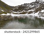 Gold Cord Lake partially frozen at Hatcher Pass