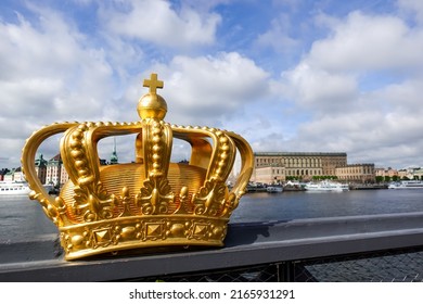 Gold Crown In Front Of The Royal Castle In Stockholm, Sweden As A Symbol Of Monarchy On A Bright Summer Day