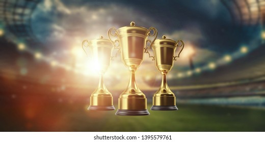 Gold Cup on the background of the stadium. Concept of sport, victory, reward. copy space.