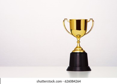 gold cup on white background.