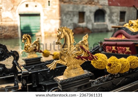 Gold decoration on the gondola. Detail Venetian Gondola Stern Detail or Ornament on the Grand Canal in Venice, Italy