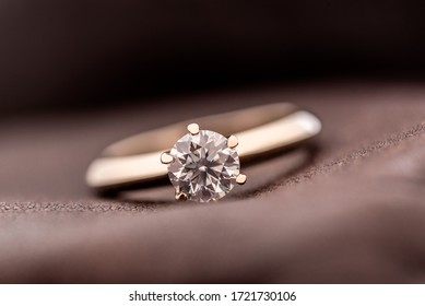 Gold Diamond Engagement Ring on Leather