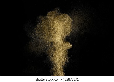 Gold Dust Glitter Shooting On Black Background