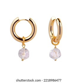 Gold earrings isolated on white background 