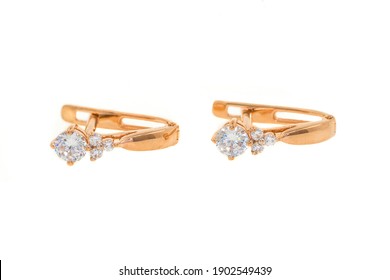gold earrings on white background - Shutterstock ID 1902549439