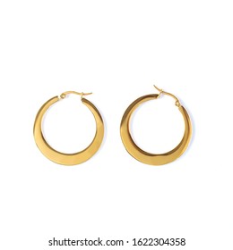 Gold Earrings On White Isolated Background