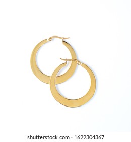 Gold Earrings on White Isolated Background