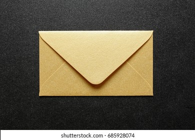 Gold Envelope On Black Background