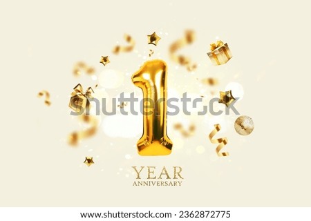 Gold festive balloons 1 year anniversary with golden confetti, presents, mirror ball and stars fly on a beige background with bokeh lights and sparks. Birthday luxury one card, a creative idea