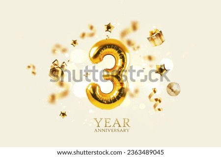 Gold festive balloons 3 year anniversary with golden confetti, presents, mirror ball and stars fly on a beige background with bokeh lights and sparks. Birthday luxury three card, a creative idea