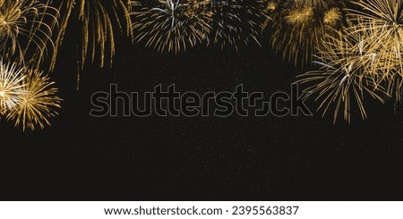 Gold fireworks on night sky background with stars. New year celebration concept