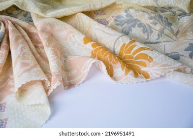 Gold Floral Abtract Pattern Fabric On White Background.