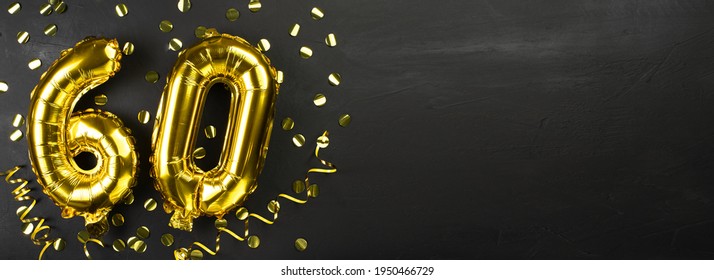 Gold Foil Balloon Number Sixty. Birthday Or Anniversary Card With The Inscription 60. Black Concrete Background. Anniversary Celebration. Banner. Copy Space