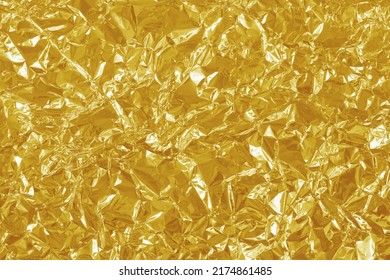 Gold foil leaf shiny texture, abstract yellow wrapping paper for background and design art work. - Shutterstock ID 2174861485