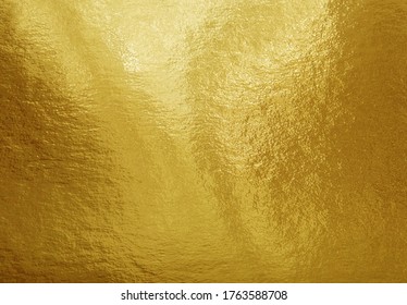 Gold foil texture background with highlights and uneven surface - Shutterstock ID 1763588708