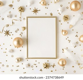 Gold frame mockup with copy space top view and Xmas decoration in gold white colors on white background isolated. Christmas background
