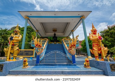 The Gold Giants Statue, Gold Serpents Statue, Small Gold Chinese Guardian Lions Statue, And Black Buddha Statue Are In The Center At Wat Cha Am Khiri, Phetchaburi, Thailand