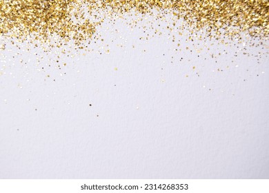 gold glitter on white background - Shutterstock ID 2314268353