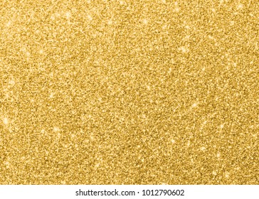 Gold glitter texture sparkling shiny wrapping paper background for Christmas holiday seasonal wallpaper  decoration, greeting and wedding invitation card design element - Shutterstock ID 1012790602