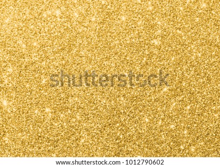 Gold glitter texture sparkling shiny wrapping paper background for Christmas holiday seasonal wallpaper  decoration, greeting and wedding invitation card design element