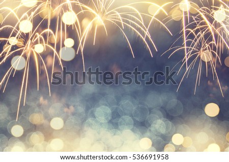 Gold and green Fireworks and bokeh in New Year eve and copy space. Abstract background holiday.