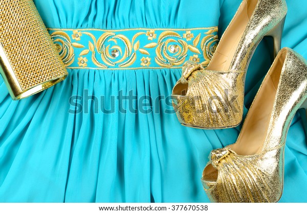 blue and gold clutch bag