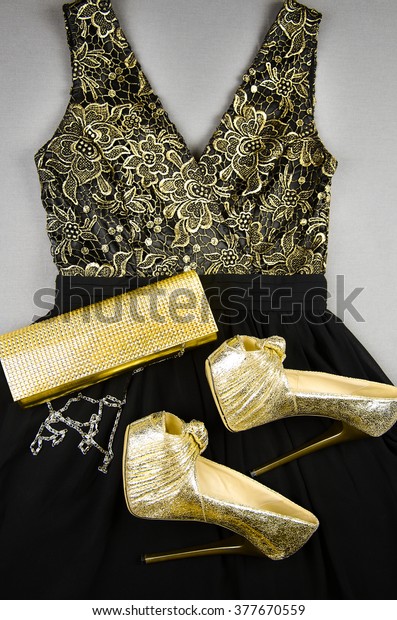 gold shoes and clutch bag