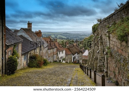 Gold Hill is a steep cobbled street in the town of Shaftesbury in the English county of Dorset. The view looking down from the top of the street has been described as 