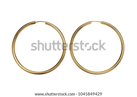 gold hoop earrings on white background