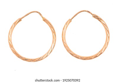 Gold hoop earrings. Round golden earrings isolated on white background.  Elegant and romantic gift - Shutterstock ID 1925070392