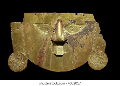 Gold Inca Mask With Black Background