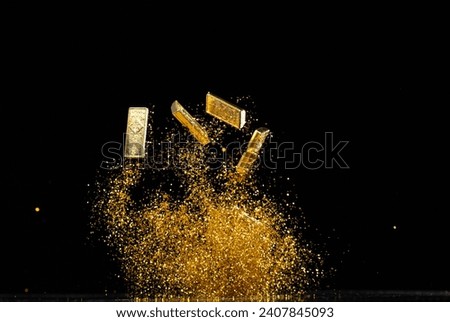 Gold Ingot Chinese Money bar token fly with dust particle in air. Chinese new year Yuanbao gold bar floating to golden money sand particle. Language is wealthy prosperity. Black background isolated