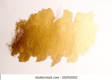 Gold Ink Texture Paint . Shining Brush Background