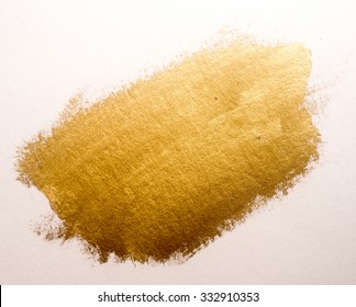 Gold Ink Texture Paint . Shining Brush Background