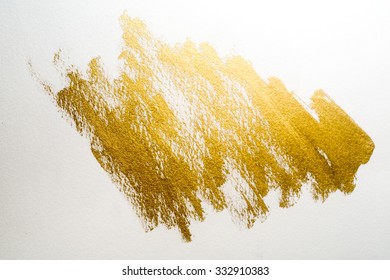 Gold Ink Texture Paint . Shining Brush Background