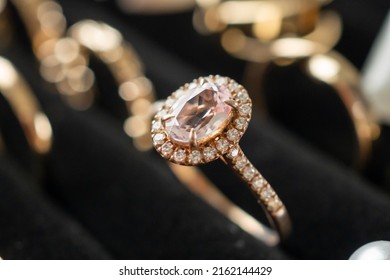 Gold jewelry diamond rings show in luxury retail store display showcase - Shutterstock ID 2162144429