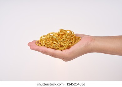 Gold jewelry on white background - Powered by Shutterstock