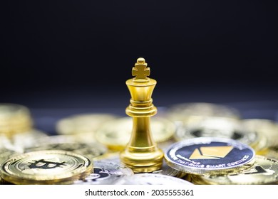 Gold king Chess on the Crypto currency. It's is convenient payment in economy market, the modern way of exchange in the coming future for finance investment trade concept on chess board background.