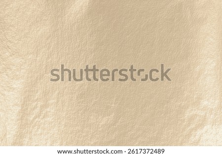 Gold leaf background with a smooth, matte texture. Soft gold, antique design with glistering gold foil and metallic shine. Subtle, refined finish, creating a luxurious, vintage feel. Shimmering,