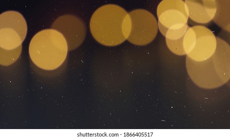 Gold Light Bokeh with Film Dust Photo Overlay, Abstract Blur Holiday Decoration, Magic Glow Sprakle Defocused Effect, Beautiful Glitter Elegant Texture. Use a Screen Blending Mode.