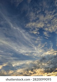 Gold light of sunset,dark blue,grey cloudy,cold,wind  blow,winter comes,glad,special view.
