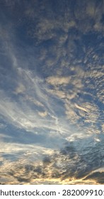 Gold light of sunset,dark blue,grey cloudy,cold,wind  blow,winter comes,glad,special view.