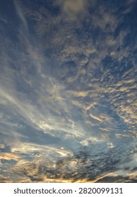Gold light of sunset,dark blue,grey cloudy,cold,wind  blow,winter comes,glad,special view.