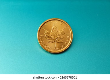 Gold Maple Leaf Coin On Metal 